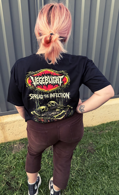Distorted Reality Vegeblight T-Shirt featuring an abstract, colorful vegetable-themed graphic on a casual unisex tee.